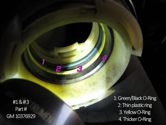 Crossover seals (GM 10376929) and retainers